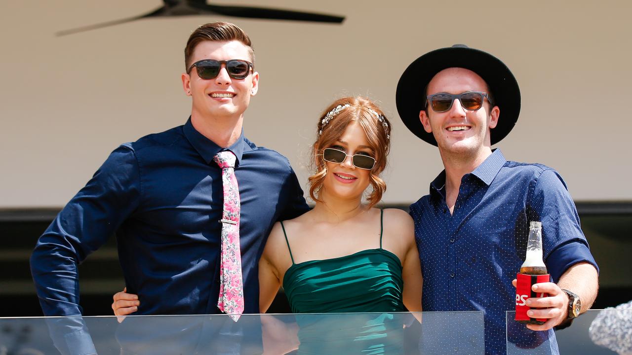 Simon Sutcliffe, Nadia Goad and Tyrone Pedretti enjoy the 2020 Great Northern Darwin Cup. Picture: GLENN CAMPBELL