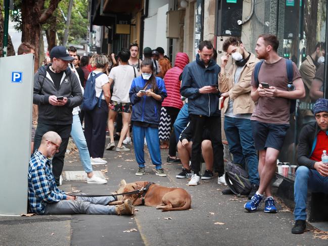 TAUS 60th Anniversary. 23-02-2020 - People line up at Centrelink in Surry Hills. Sydney is is shutdown to control the spread of the Corona virus after the PM Scott Morrison ordered the shutdown of cafes, pubs and many other non- essential services. John Feder/The Australian.