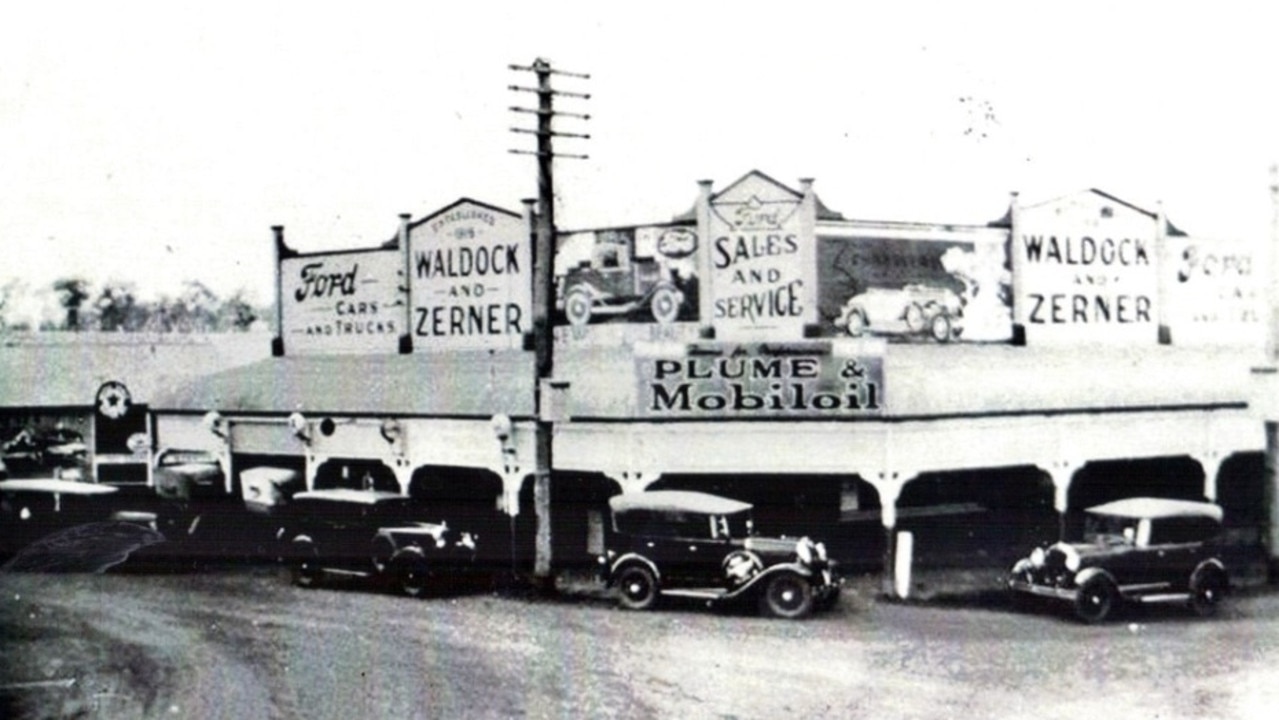 Waldock and Zerner Garage on the corner of Lamb and Macalister Streets, Murgon, showcasing Ford cars and trucks in a thriving early motor sales hub. Source: QldPics