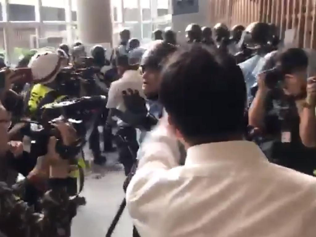 Charles Mok clashes with police. Picture: Naomi Ng/Twitter