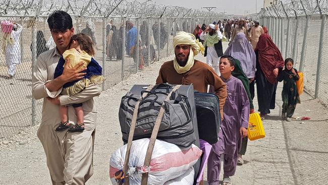 Stranded Afghan nationals at the Pakistan-Afghanistan border crossing point in Chaman in 2021. Picture: AFP.