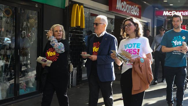 Former Prime Minister Malcolm Turnbull, his wife Lucy Turnbull and Member for Wentworth Allegra Spender walking down the main street in Kings Cross handing out flyers to campaign for the Voice to Parliament in Sydney. Picture: NCA Newswire/ Gaye Gerard