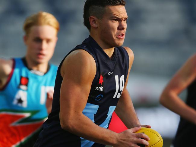 GEELONG, AUSTRALIA - JULY 05:  Cameron Rayner of Vic Metro runs with the ball during the U18 AFL Championships match between Vic Metro and the Allies at Simonds Stadium on July 5, 2017 in Geelong, Australia.  (Photo by Michael Dodge/Getty Images)