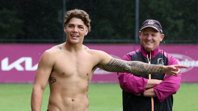 Walsh has been all smiles at training this week, picture with coach Kevin Walters. Picture: Liam Kidston