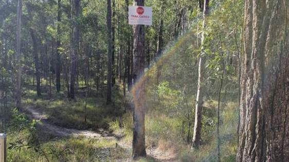 New signage where Nerang forest trails are closed to bike riders in the Gold Coast hinterland.