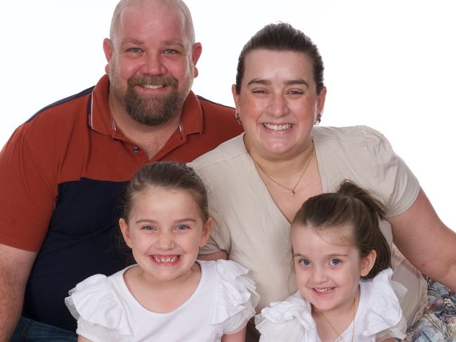 Aaron and Zoey Mitchell and their daughters Eva and Charlotte.