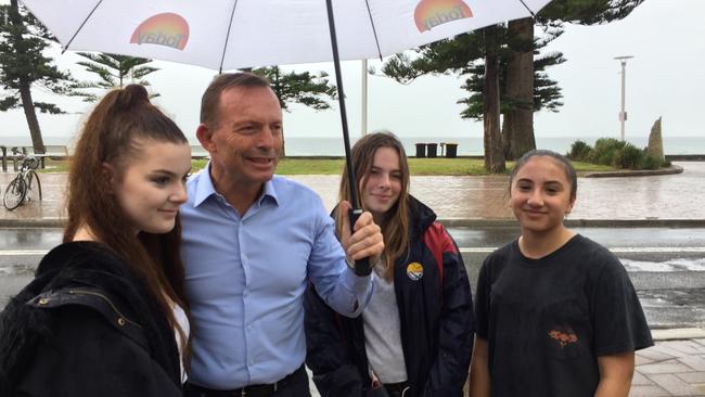 Tony Abbott was seen having coffee at Hemingway’s a few hundred metres away from the protests outside his Manly electorate office.