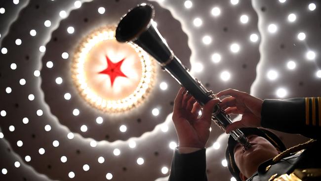 A musician in the Great Hall of the People in Beijing. Picture: AFP