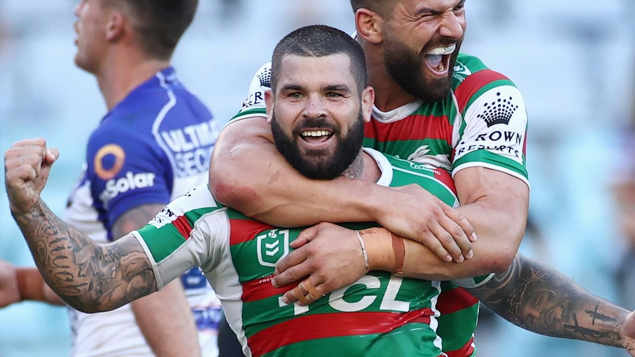 Adam Reynolds celebrates scoring a try with Josh Mansour against the Dogs