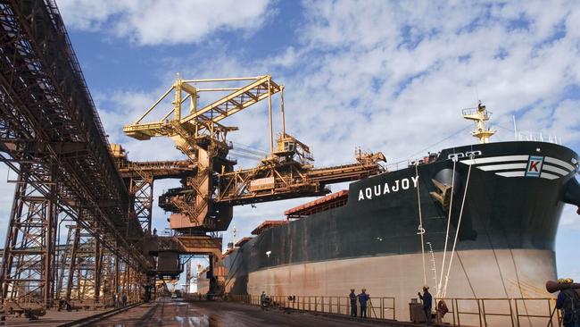 Iron ore is loaded onto a freighter in Brazil. Picture: Bloomberg News.