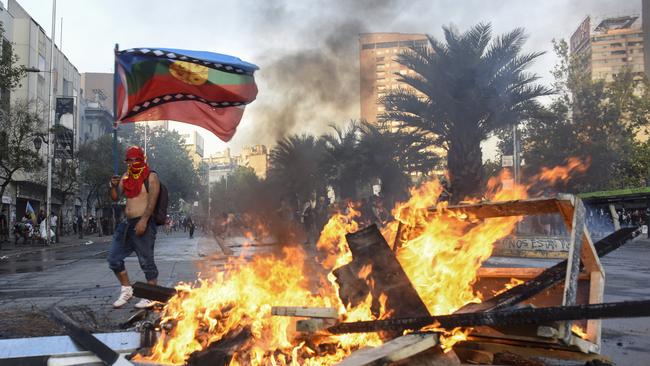 The protest that began in Santiago on October 18 against a rise in rush-hour metro fares has mushroomed into an outcry against the status quo. Picture: Getty Images