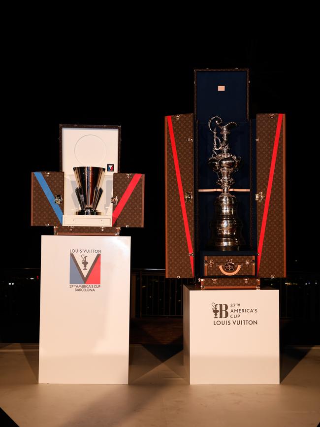 The Louis Vuitton Cup and the Auld Mug in custom Louis Vuitton trunks.