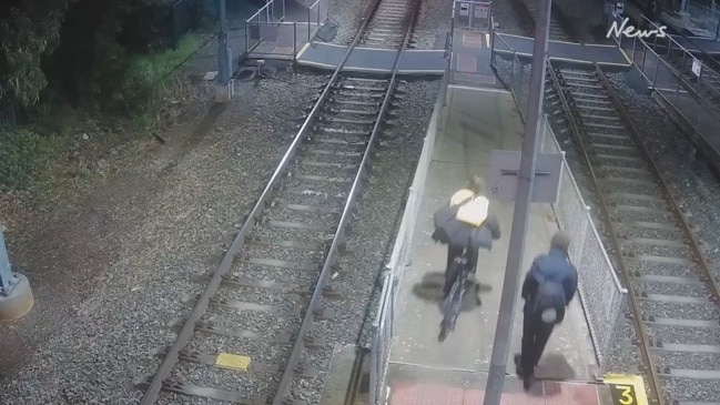 Adelaide train in bizarre near-miss with cyclist