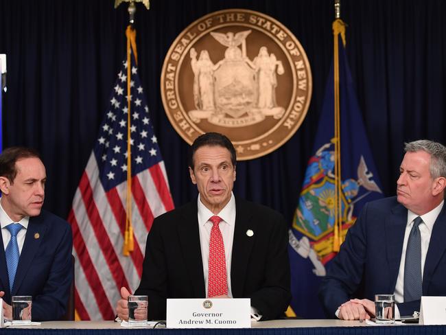 Commissioner of Health for New York State Howard Zucker, New York Governor Andrew Cuomo and New York City Mayor Bill de Blasio discuss the spread of coronavirus in New York. Picture: AFP