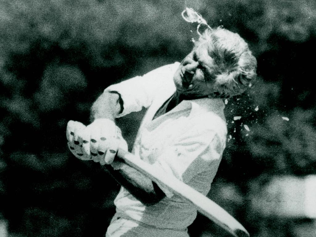 Prime Minister Bob Hawke has his glasses broken & face bruised when he misses an ambitious hook during a friendly game against the Canberra press gallery in 1984. Picture: Graeme Thomson