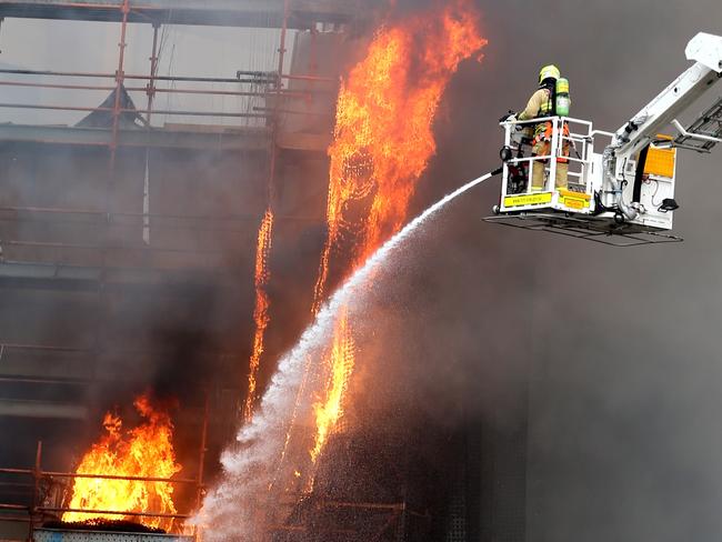 Firefighters battled the out of control blaze. Picture: John Grainger