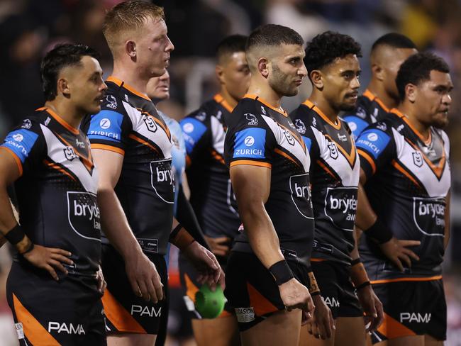 WOLLONGONG, AUSTRALIA - JUNE 07:  Wests Tigers players look on after a Dragons try during the round 14 NRL match between St George Illawarra Dragons and Wests Tigers at WIN Stadium on June 07, 2024, in Wollongong, Australia. (Photo by Jason McCawley/Getty Images)