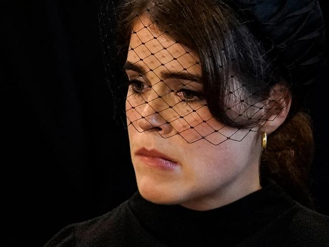 Princess Eugenie is visibly emotional during a service for the reception of Queen Elizabeth II's coffin at Westminster Hall. Picture: AFP.