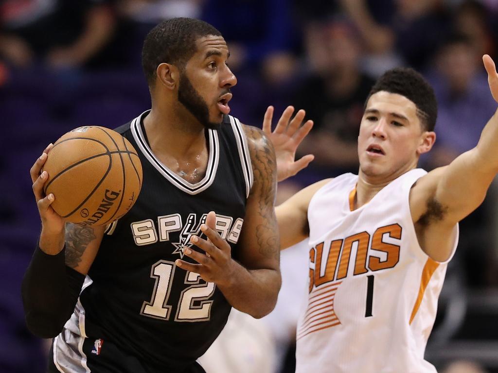 Aldridge (left) is waving goodbye to San Antonio.