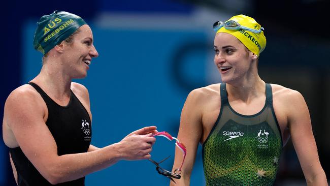 Emily Seebohm speaks to Kaylee McKeown after they finished third and first in the 200m backstroke. Picture: AFP