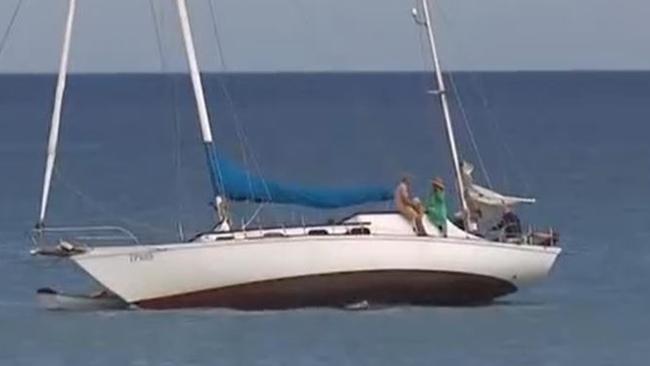 Police rescue some boaties after their yacht becomes stuck on a sandbar off of Semaphore . Picture: 7NEWS