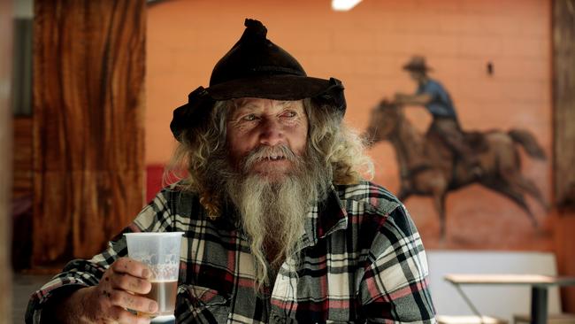 "Wild' Bill Ellis of Tannymorel who brings lead Steers to the Ekka every year has a few drinks at the Cattleman's Bar. Pic Mark Calleja