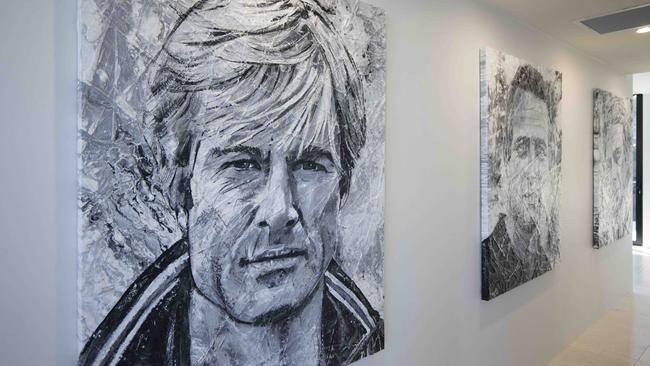 Black-and-white portraits of Hollywood legends line the hallway. Picture: Glenn Hunt