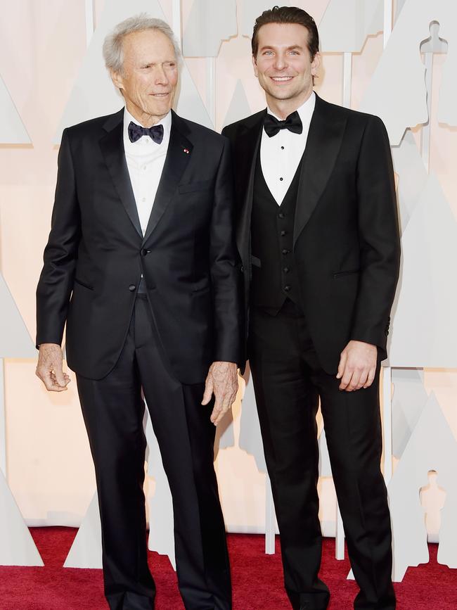 Clint Eastwood and actor Bradley Cooper attend the Oscars 2015 red carpet. Picture: Getty