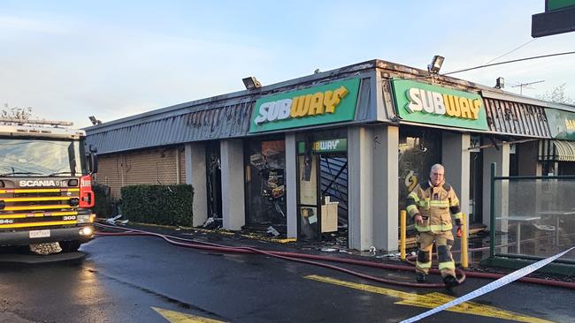 Firefighters remained at the scene about 8am Wednesday to assess the damage and put out any spot fires from the Thornbury blaze. Picture: Jordan McCarthy