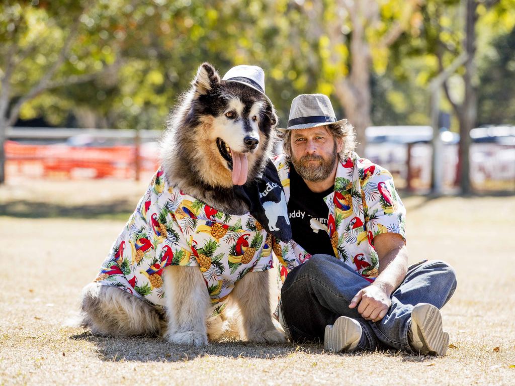 Russ Ellom with Buddy at Paws at the Park held at Mudgeeraba showground on Sunday. Picture: Jerad Williams