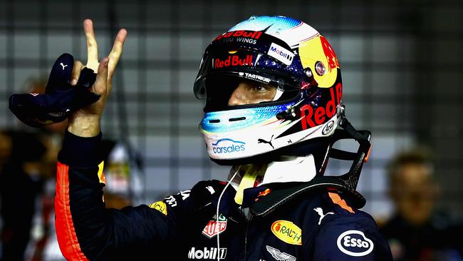 Australia’s Daniel Ricciardo celebrates securing third place on the grid for the Singapore GP.