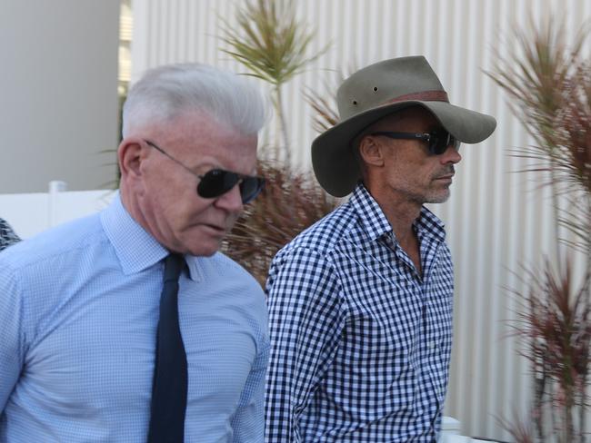 Former Darwin City Councillor Paul Arnold with his barrister Jon Tippett going into Darwin Local Court to face stalking and domestic violence related charges on Monday, May 20. Picture: Zizi Averill