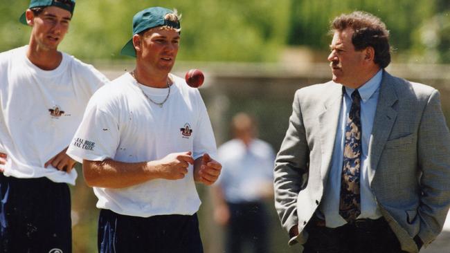 Warne at training prior to a Sheffield Shield match with former cricketer Terry Jenner.