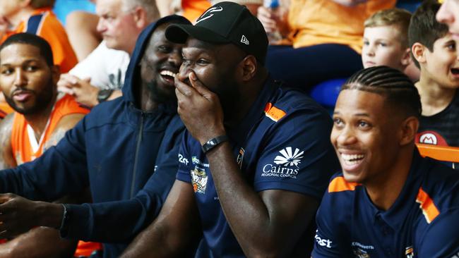 Majok Deng, Nate Jawai and Scott Machado share a laugh together during the National Basketball League (NBL) pre season match between the Cairns Taipans and the Brisbane Bullets, held at Early Settler Stadium, Manunda. PICTURE: BRENDAN RADKE