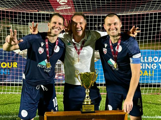 Marlin Coast coach Crios O'Hare, assistant coach Gavin Broomhead and captain Charlie Beverley after claiming the Crad Evans Trophy. Picture: Supplied