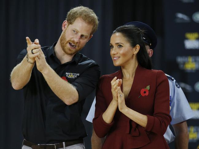 Prince Harry, Duke and Meghan, Duchess of Sussex pictured at the Invictus Games Wheelchair Basketball gold medal game at the Quaycentre arena at Sydney Olympic Park in Homebush, Sydney. Picture: Richard Dobson