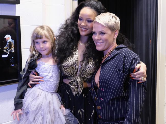 Willow Hart, recording artists Rihanna and Pink backstage at the 60th Annual GRAMMY Awards. Picture: Getty