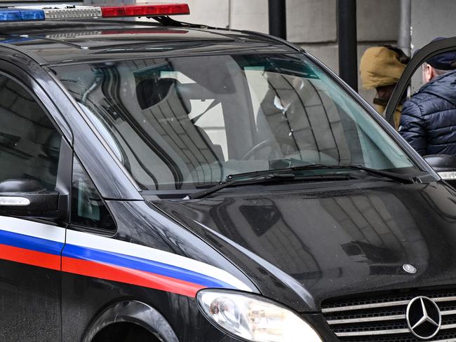 Mr Gershkovich is escorted out of the Lefortovo court in Moscow on March 30. Picture: AFP