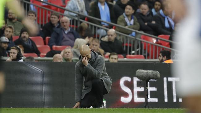 Manchester City coach Pep Guardiola reacts during the English FA Cup semi-final soccer match between Manchester City and Brighton & Hove Albion. Picture: AP Photo/Matt Dunham