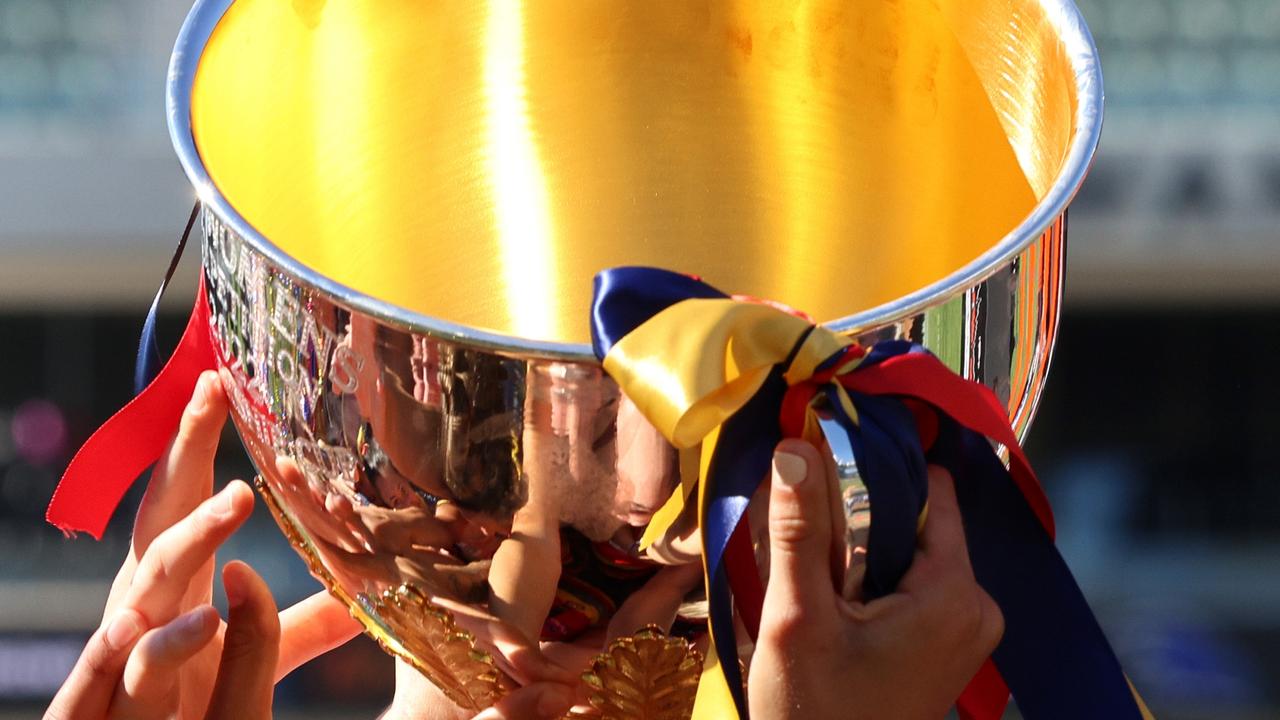 The premiership cup at the 2022 AFLW grand final between the Adelaide Crows and the Melbourne Demons.