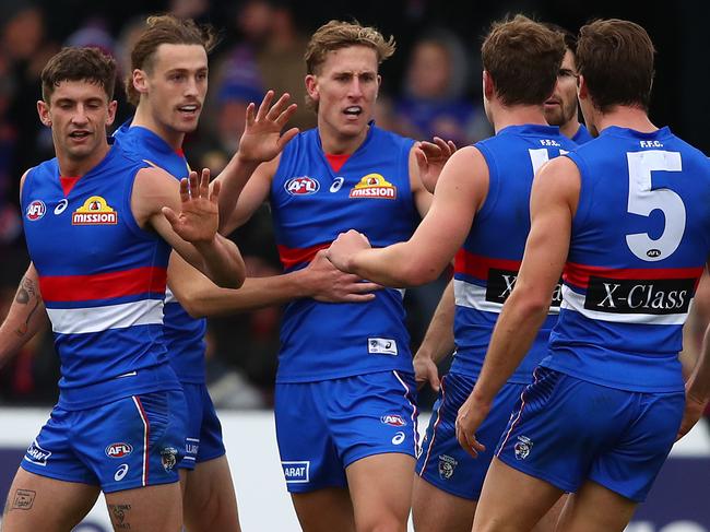 BALLARAT, AUSTRALIA - MAY 11: Aaron Naughton of the Bulldogs celebrates after kicking a goal during the round eight AFL match between the Western Bulldogs and the Brisbane Lions at MARS Stadium on May 11, 2019 in Ballarat, Australia. (Photo by Scott Barbour/Getty Images)