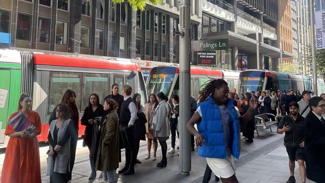 Customers line up down George St for Oti’s opening.