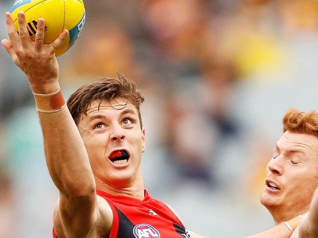 MELBOURNE, AUSTRALIA - APRIL 15:  Jake Lever of the Demons marks the ball during the round four AFL match between the Hawthorn Hawks and the Melbourne Demons at Melbourne Cricket Ground on April 15, 2018 in Melbourne, Australia.  (Photo by Daniel Pockett/AFL Media/Getty Images)