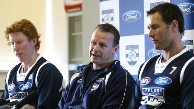 Cameron Ling, Hinkley and Ben Graham during a Geelong press conference while he was an assistant at the club.