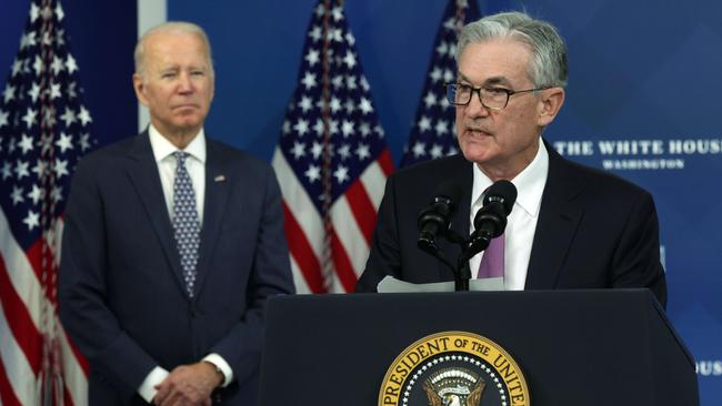 Joe Biden announced a second term for Jerome Powell, right, as Federal Reserve chairman at the White House on Tuesday. Picture: Getty Images / AFP