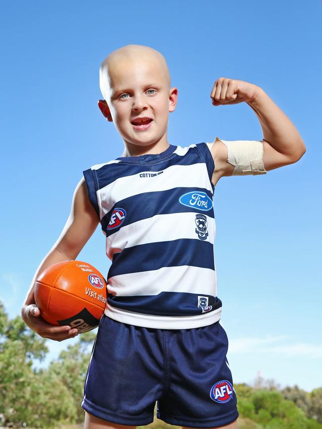 Charlie’s really giving it his all as mini Gary Ablett. Picture: Michael Dodge