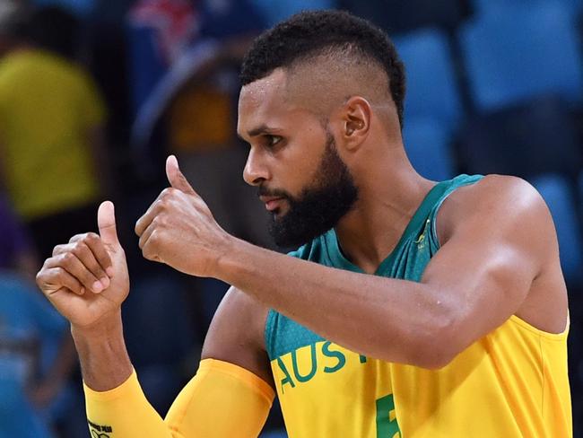 Australia's guard Patty Mills reacts after defeating Lithuania during a Men's quarterfinal basketball match between Australia and Lithuania at the Carioca Arena 1 in Rio de Janeiro on August 17, 2016 during the Rio 2016 Olympic Games. / AFP PHOTO / Mark RALSTON