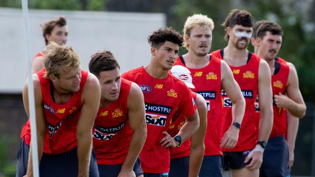 Suns Academy player Jake Rogers (fourth from right) trains with the senior squad during pre-season. Photo: Gold Coast Suns