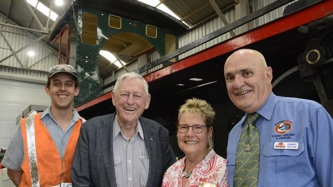 STEAMING ALONG: Toowoomba's Downssteam Tourist Railway and Museum's Andrew Caldwell (left), president Ros Scotney and marketing manager Robert Ketton (both right) can finally complete the rebuild of historic steam engine the Pride of Toowoomba, thanks to a $300,000 contribution from millionaire philanthropist Clive Berghofer (centre left).