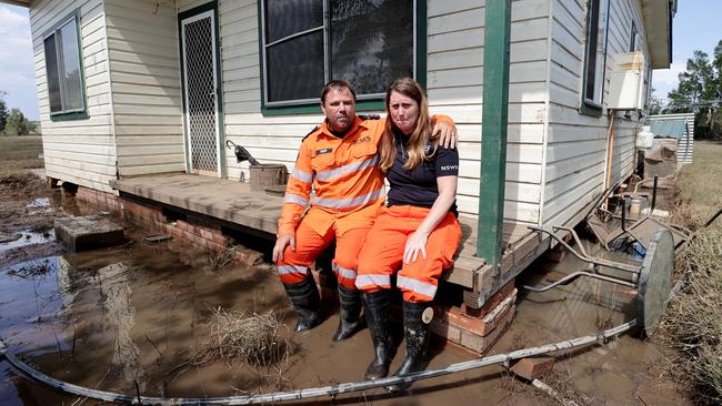 Volunteers Daniel Clark and Nancy Grimm returned to their home in Coraki on Sunday to find they had lost all their belongings. Pictures: Toby Zerna